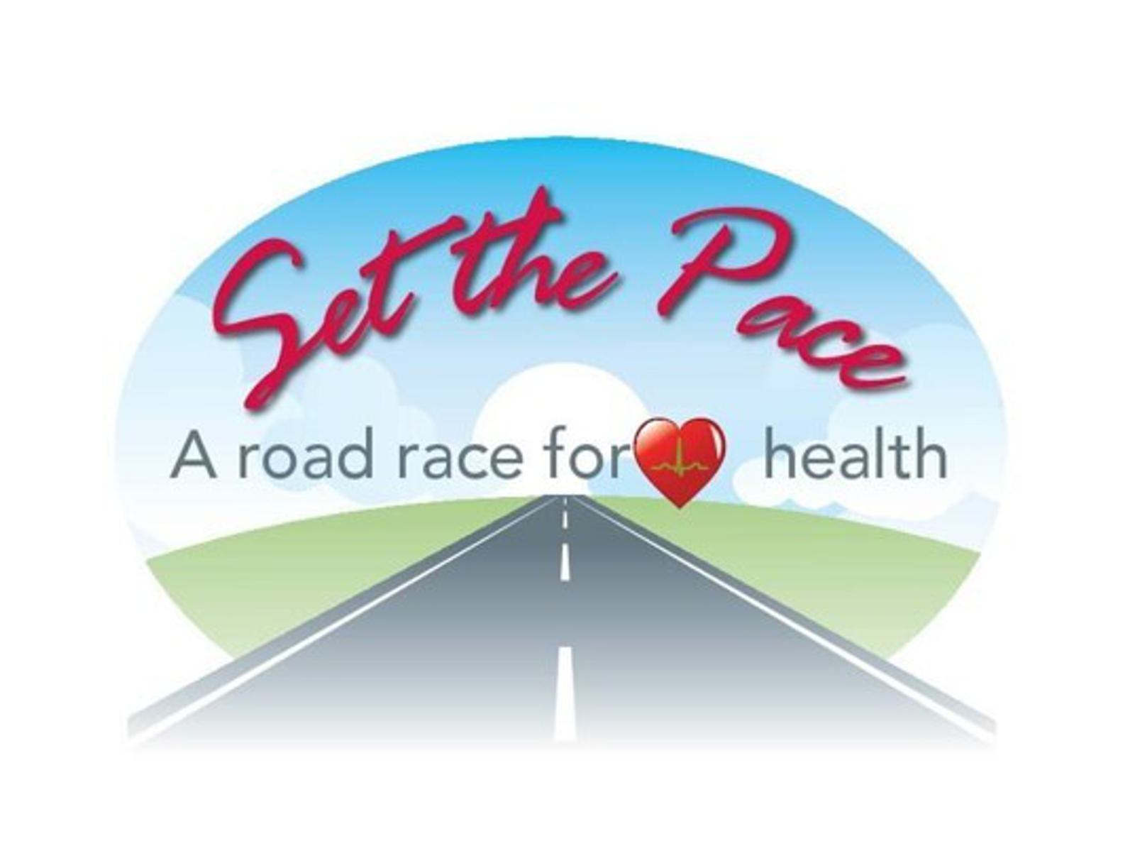Logo with a road leading to the horizon under a blue sky. Text reads "Set the Pace" in red, with "A road race for health" below, featuring a heart shape with a pulse line.