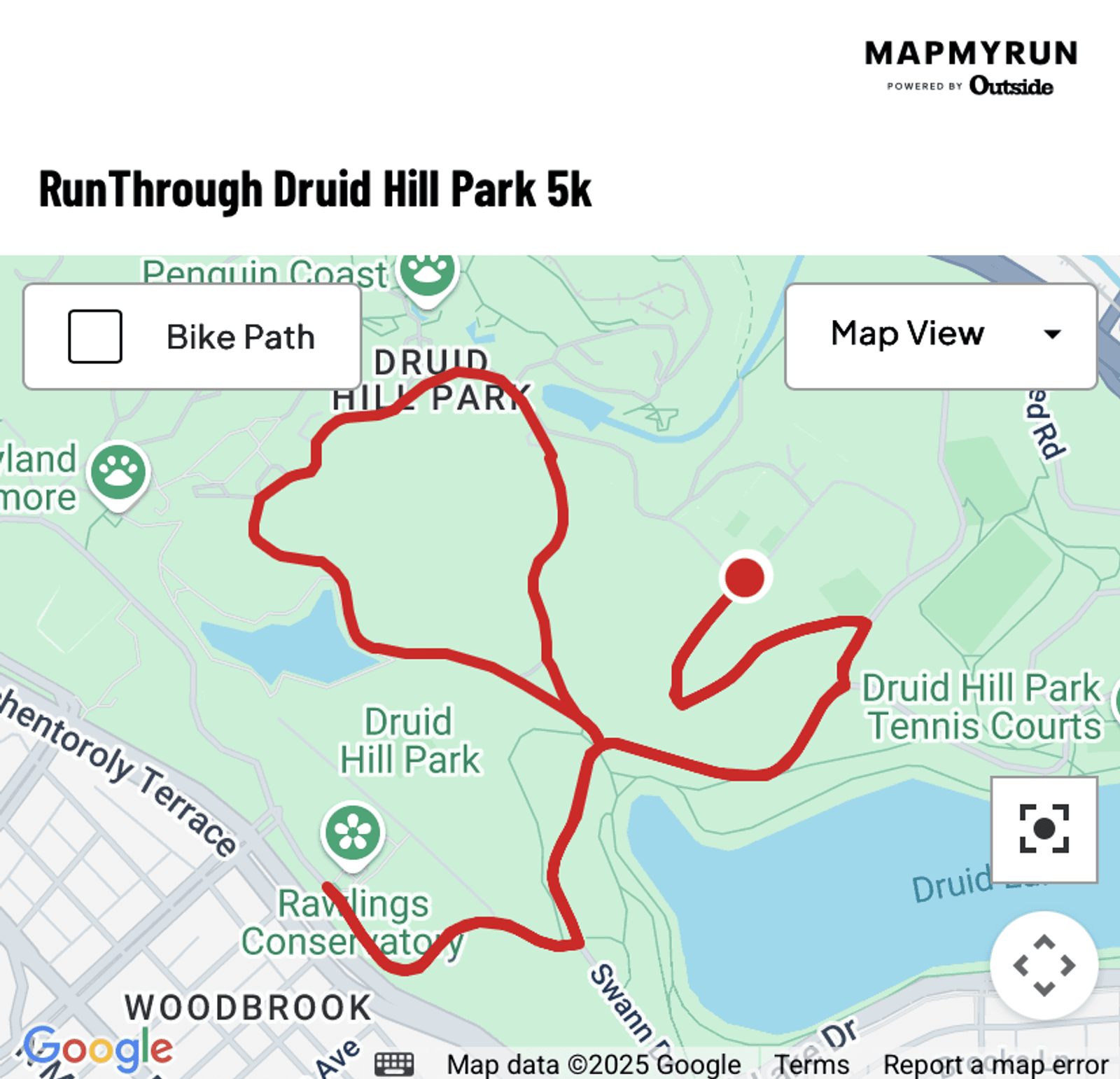 A map showing the route of the "RunThrough Druid Hill Park 5k." The red path winds through Druid Hill Park, passing near a pond, tennis courts, and other park areas. Icons mark bike paths and park amenities.