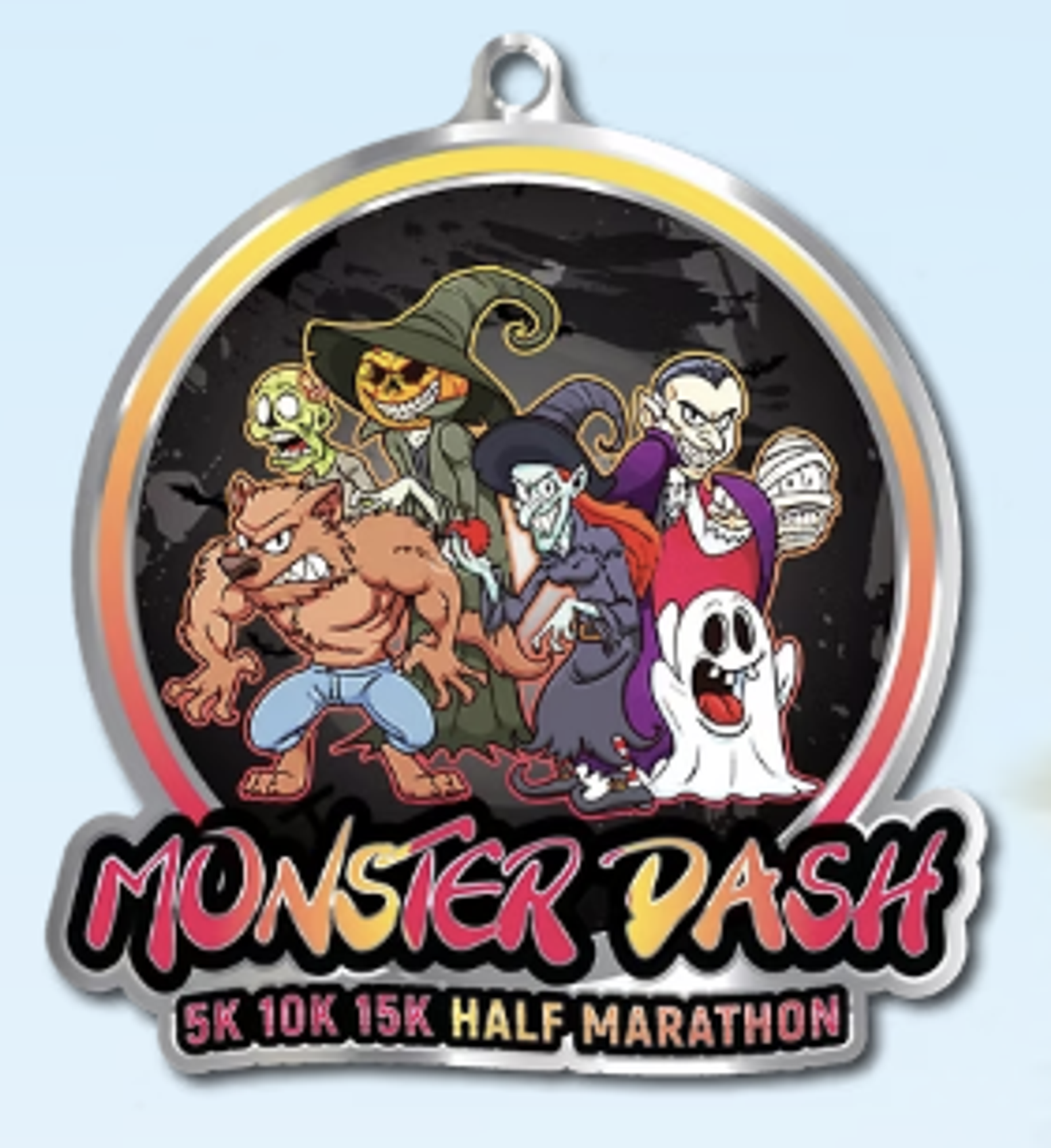 A colorful medal features cartoon monstersβincluding a werewolf, pumpkin-headed scarecrow, witch, vampire, mummy, and ghostβwith "Monster Dash" and "5K 10K 15K Half Marathon" written below them.